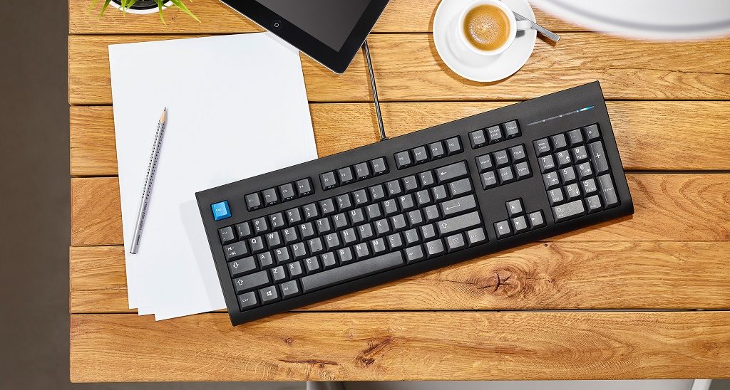 UNIQEY_Q100_graphite_white_wooddesk.jpg